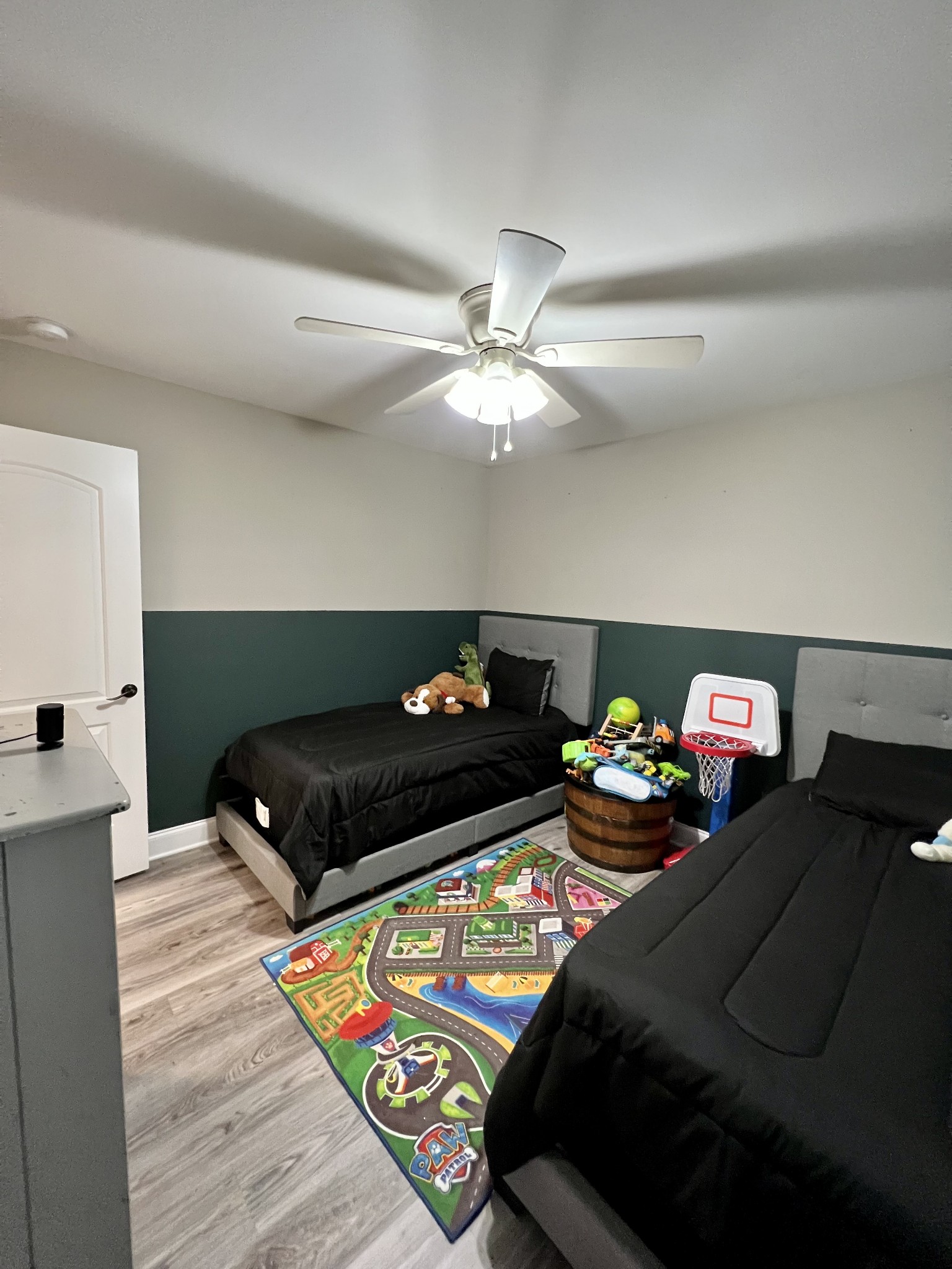 418 Taylor Road Manchester, TN 37355 - Photo 25 of 30 a bedroom with bed and a chandelier