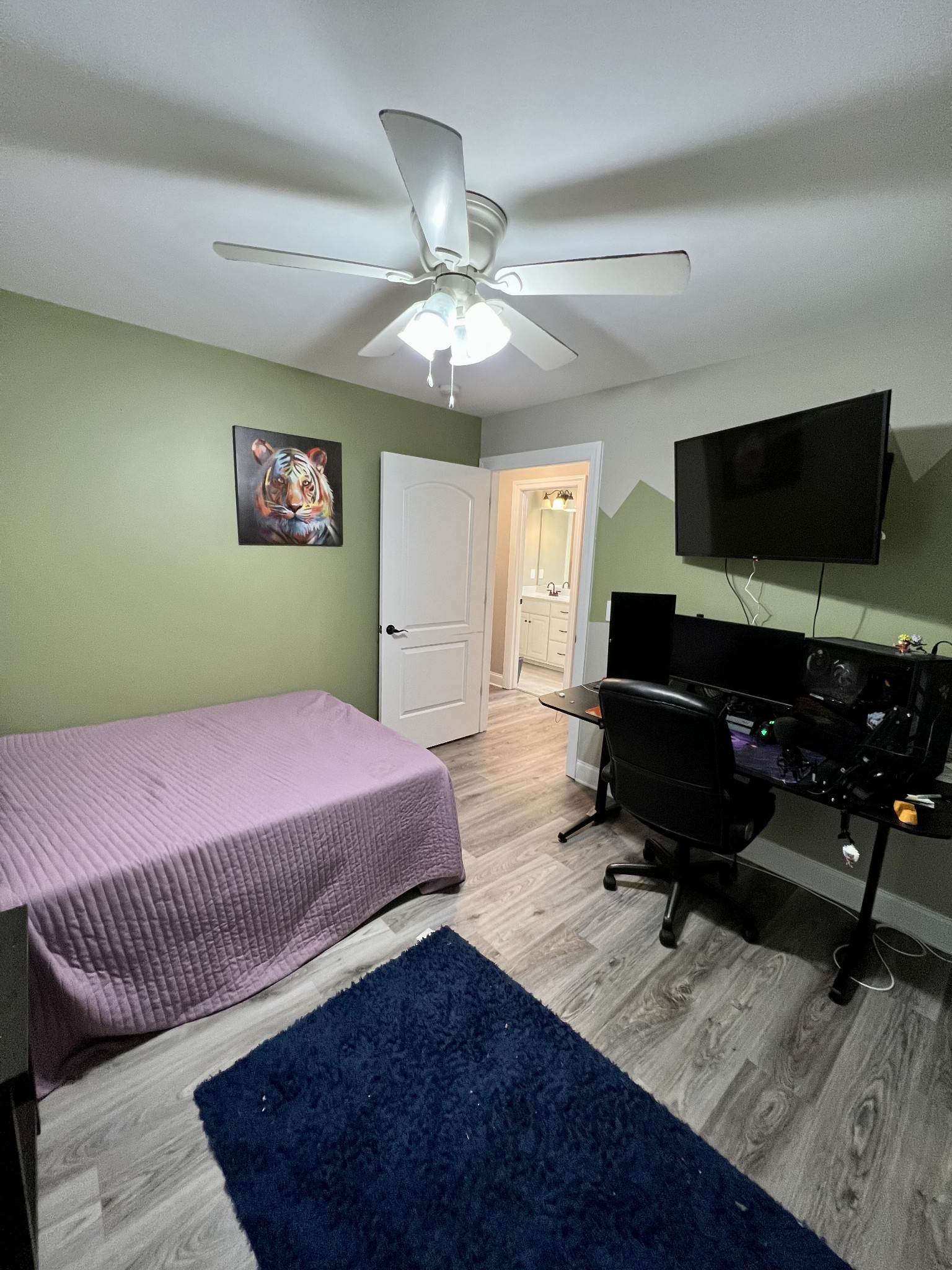 418 Taylor Road Manchester, TN 37355 - Photo 27 of 30 a bedroom with a bed and a flat screen tv