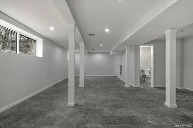 a bathroom with a sink toilet and vanity