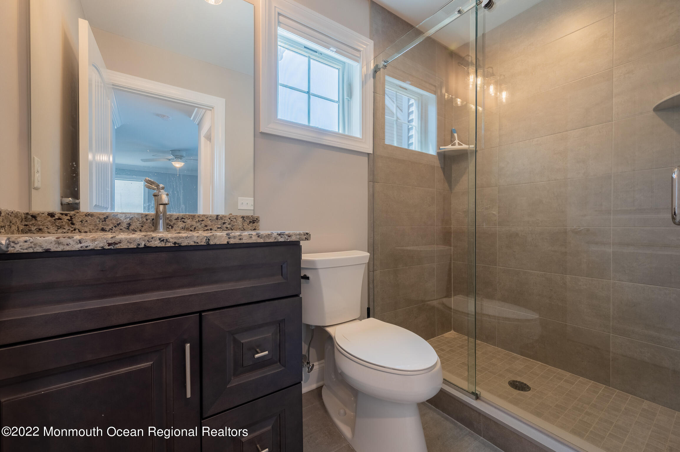 29 Fielder Avenue Seaside Heights, NJ 08751 - Photo 13 of 31 a bathroom with a sink a toilet and shower