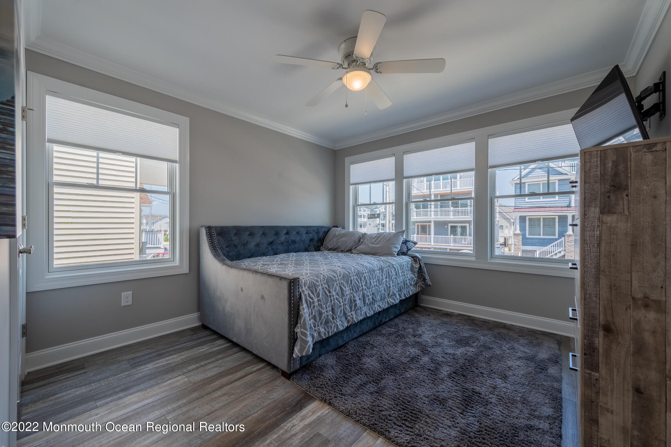 29 Fielder Avenue Seaside Heights, NJ 08751 - Photo 20 of 31 a living room with a bed furniture and a large window