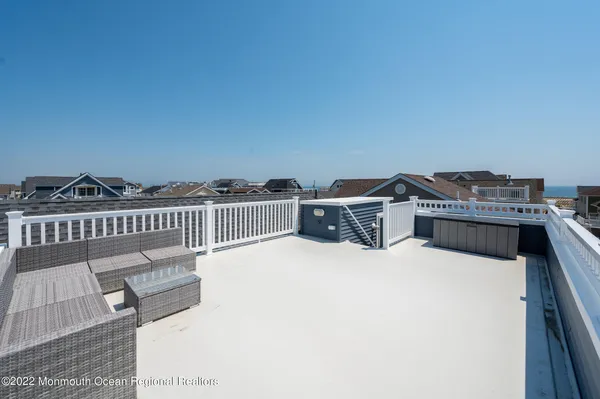 a terrace view with two chairs