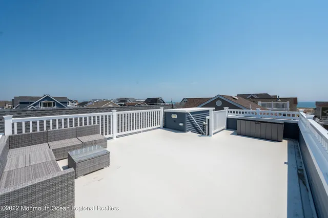 a terrace view with two chairs