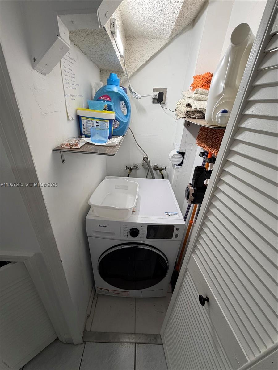 13855 Southwest 64th Street, Unit 13855 Miami, FL 33183 - Photo 11 of 31 a utility room with dryer and washer