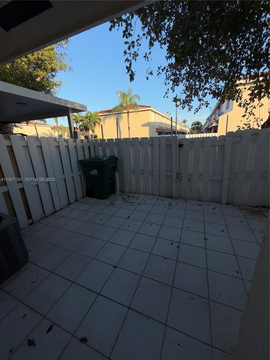 13855 Southwest 64th Street, Unit 13855 Miami, FL 33183 - Photo 28 of 31 a view of a backyard