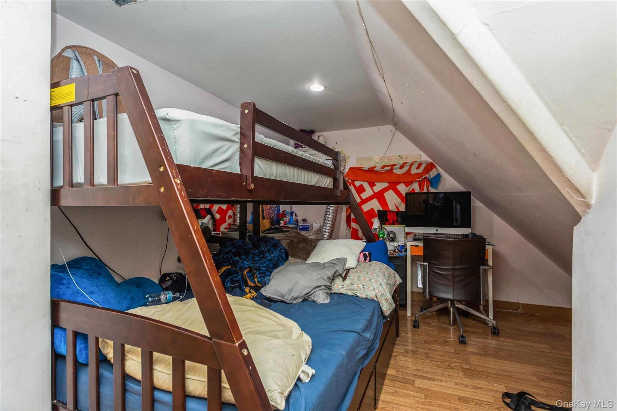 327 North 7th Avenue Mount Vernon, NY 10550 - Photo 16 of 32 a living room with furniture and wooden floor