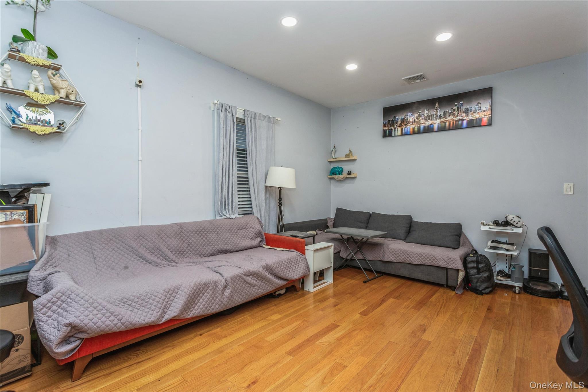 327 North 7th Avenue Mount Vernon, NY 10550 - Photo 18 of 32 a living room with furniture and painting on the wall