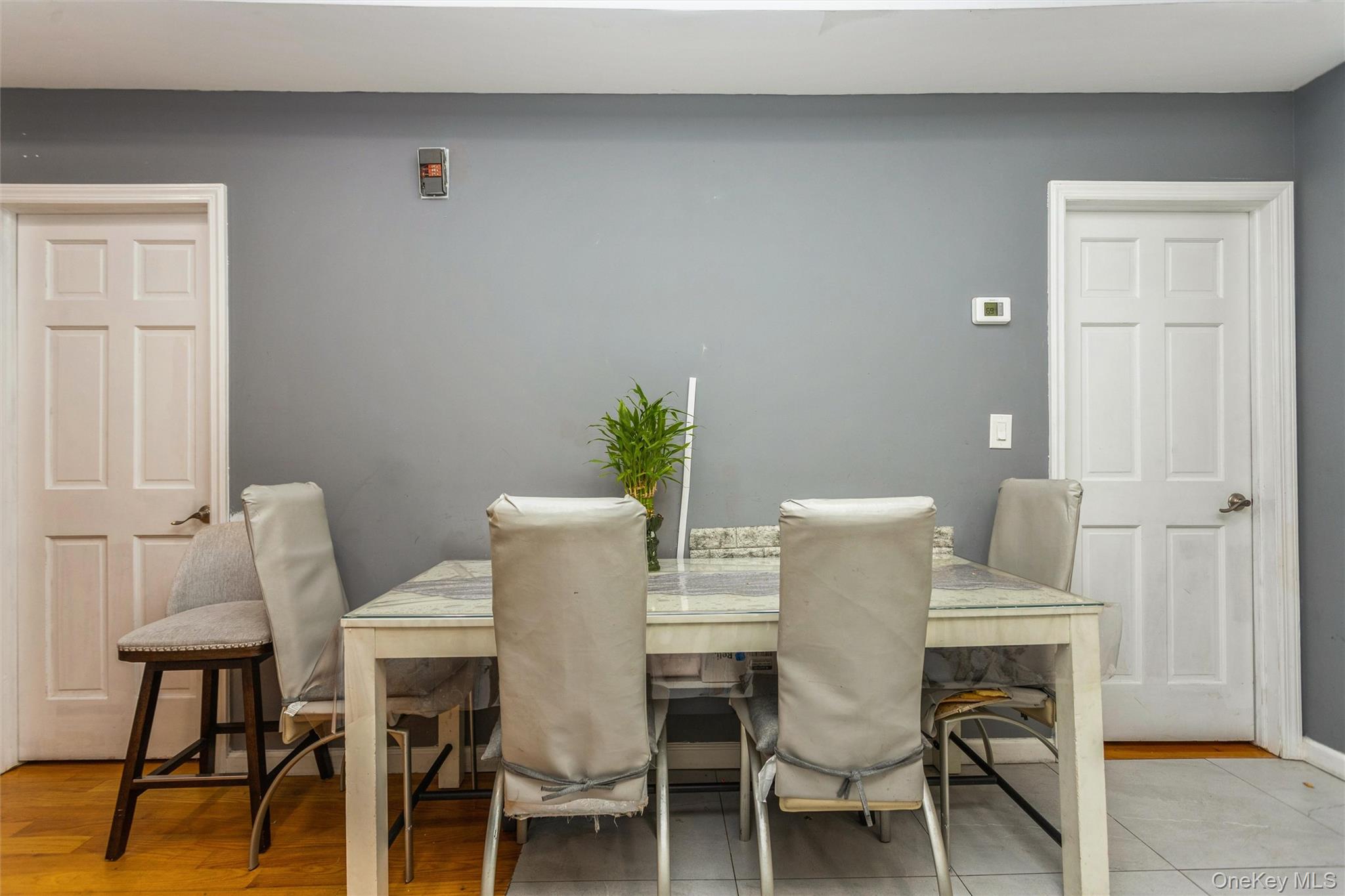 327 North 7th Avenue Mount Vernon, NY 10550 - Photo 22 of 32 a view of a dining room with furniture and wooden floor