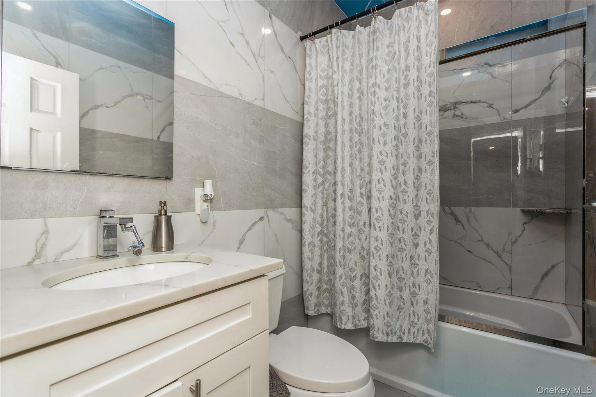 327 North 7th Avenue Mount Vernon, NY 10550 - Photo 23 of 32 a bathroom with a sink toilet and shower