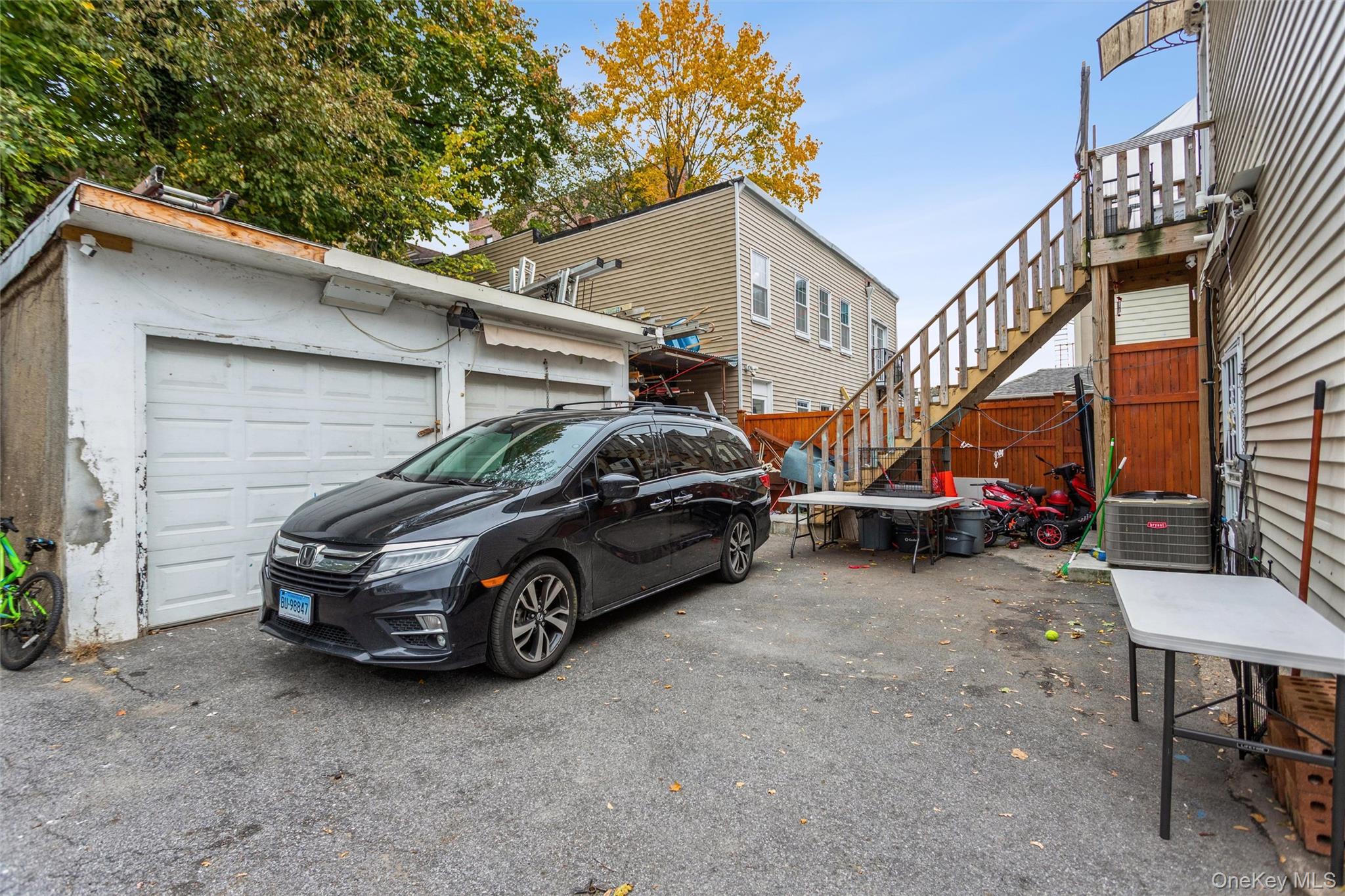 327 North 7th Avenue Mount Vernon, NY 10550 - Photo 27 of 32 a car parked in front of a house