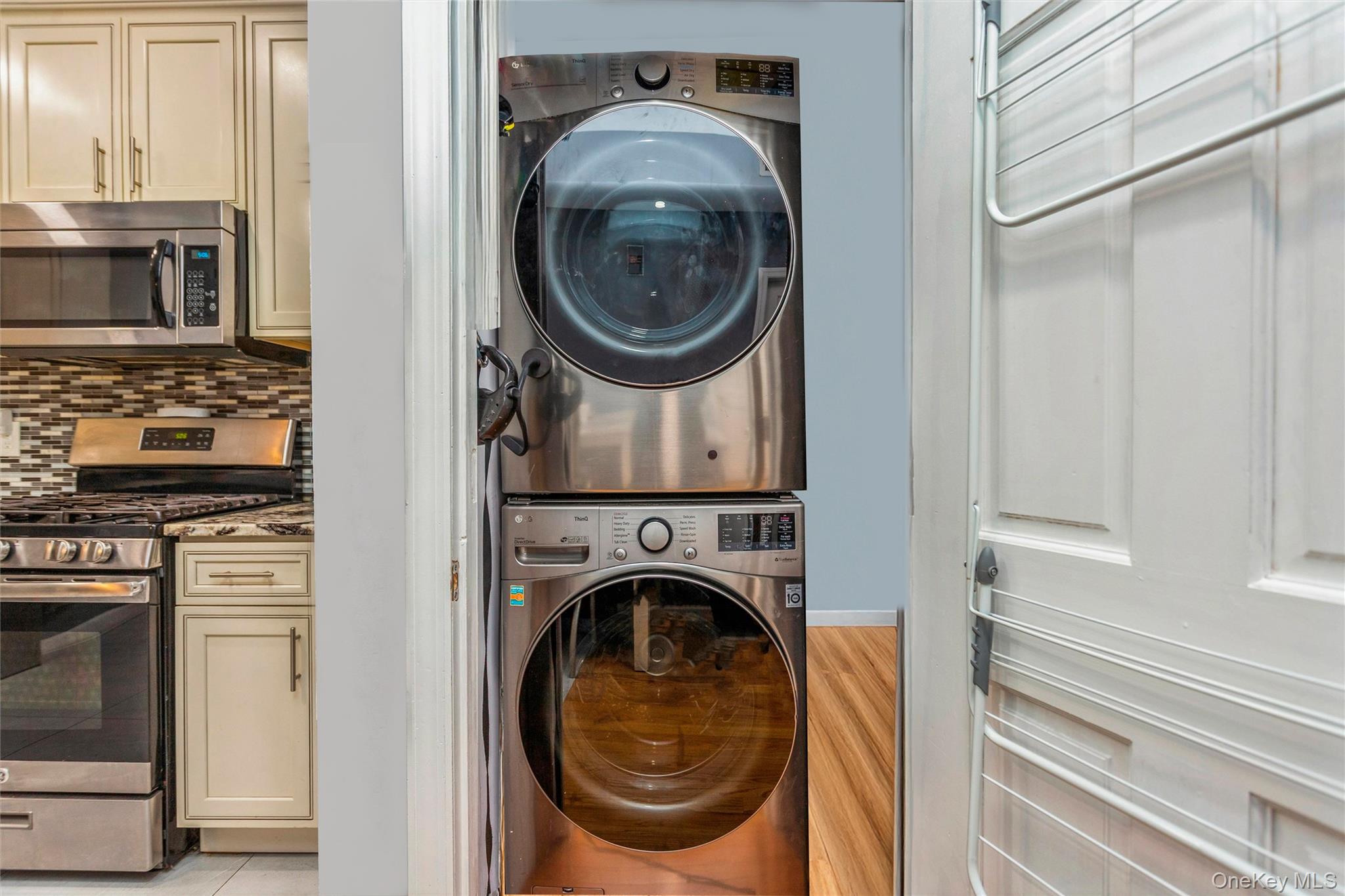 327 North 7th Avenue Mount Vernon, NY 10550 - Photo 6 of 32 a utility room with dryer and washer