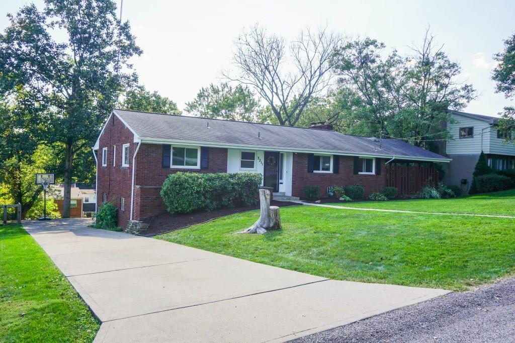 3211 Arapahoe Road Pittsburgh, PA 15241 - Photo 1 of 24 a front view of a house with garden