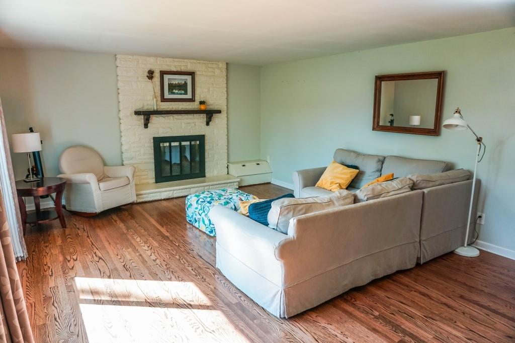 3211 Arapahoe Road Pittsburgh, PA 15241 - Photo 11 of 24 a living room with furniture and a fireplace
