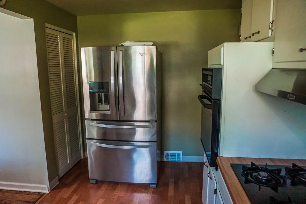 3211 Arapahoe Road Pittsburgh, PA 15241 - Photo 13 of 24 a kitchen with a refrigerator and wooden floor