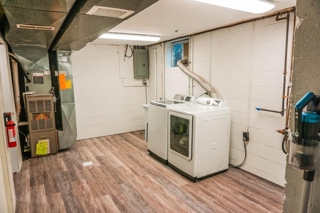 3211 Arapahoe Road Pittsburgh, PA 15241 - Photo 23 of 24 a view of a storage and utility room with washer and dryer