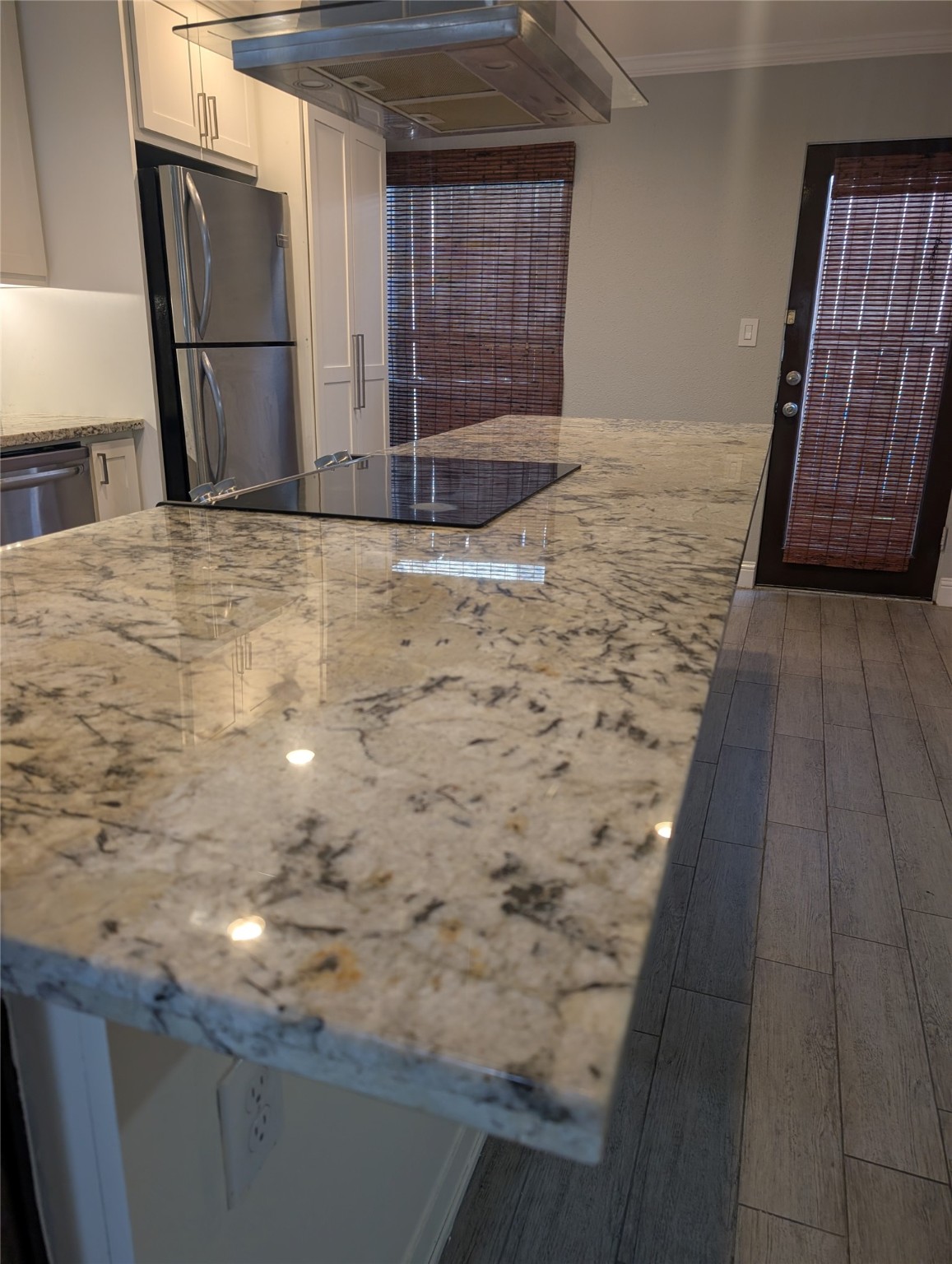 2503 McCue Road, Unit 12 Houston, TX 77056 - Photo 15 of 22 a view of empty room with wooden floor