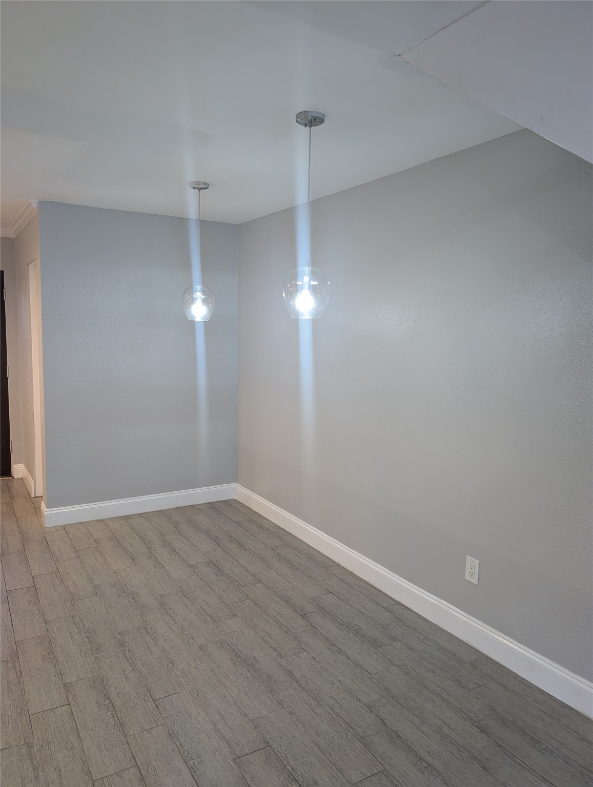 2503 McCue Road, Unit 12 Houston, TX 77056 - Photo 17 of 22 a view of an empty room with wooden floor