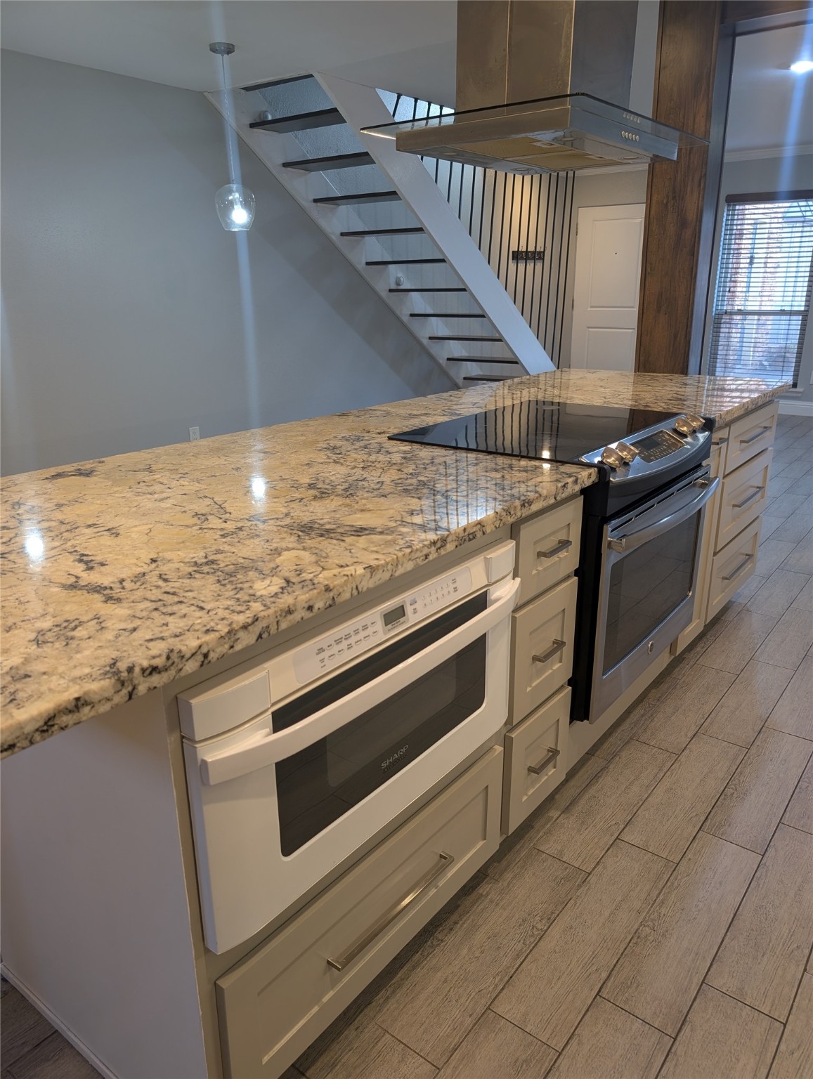 2503 McCue Road, Unit 12 Houston, TX 77056 - Photo 2 of 22 a view of kitchen with sink and stove