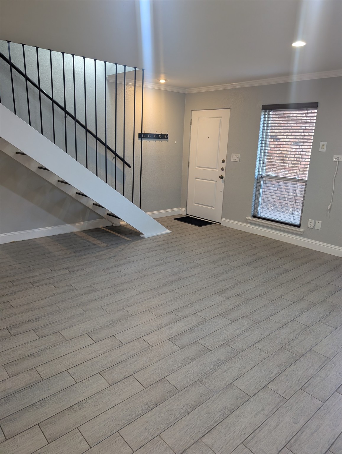 2503 McCue Road, Unit 12 Houston, TX 77056 - Photo 5 of 22 a view of an empty room with wooden floor