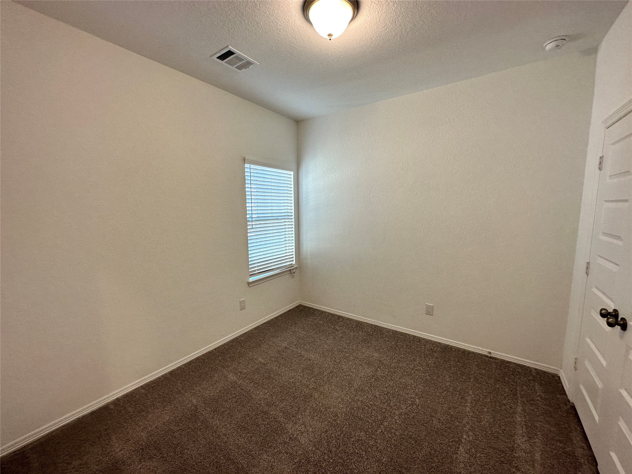 16504 Moss Lane Porter, TX 77365 - Photo 11 of 16 an empty room with windows