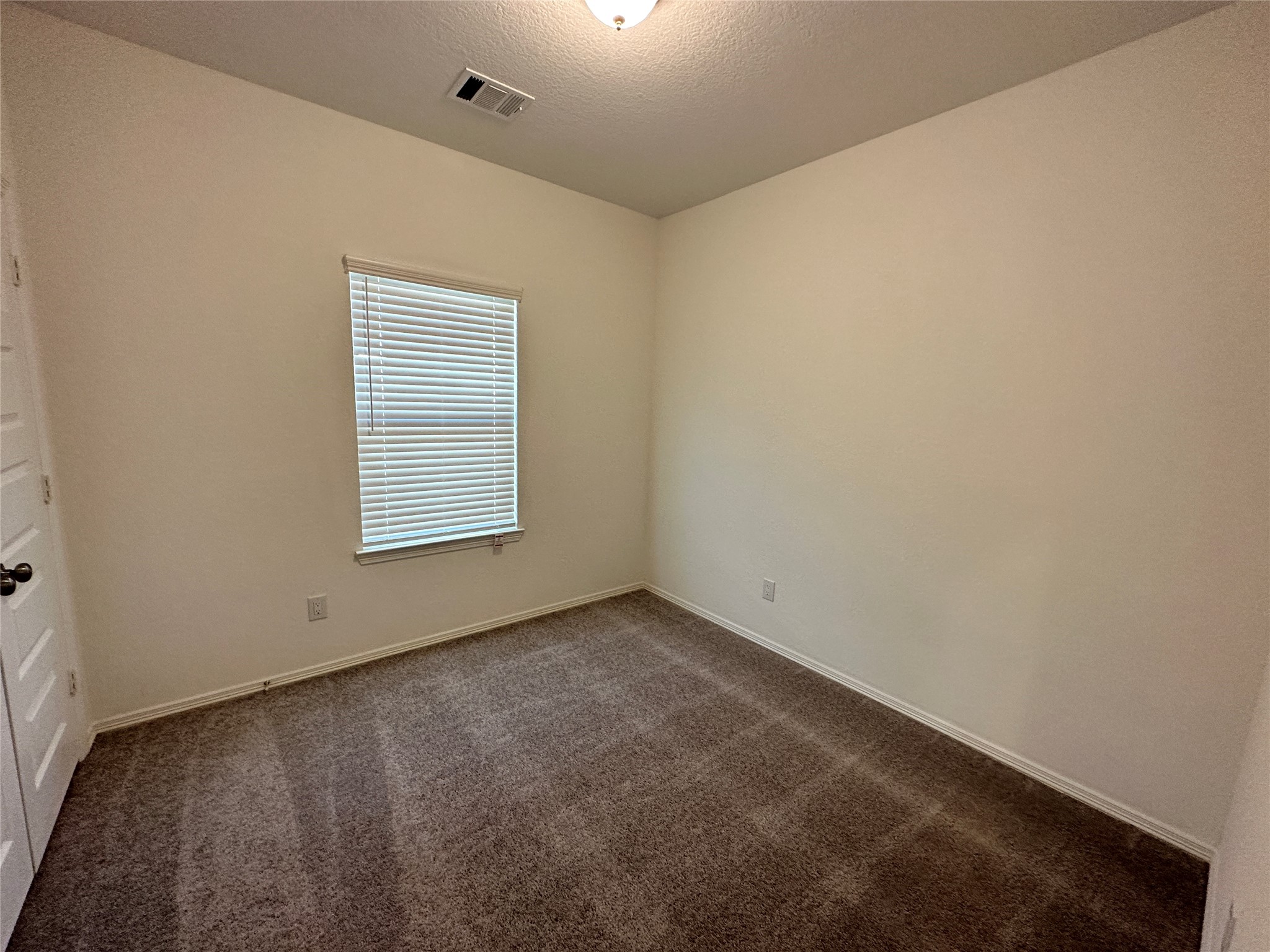 16504 Moss Lane Porter, TX 77365 - Photo 12 of 16 an empty room with windows