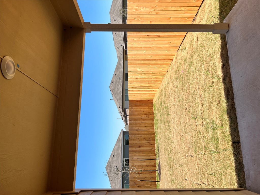 115 Canley Loop Hutto, TX 78634 - Photo 15 of 18 Fenced backyard featuring a patio area