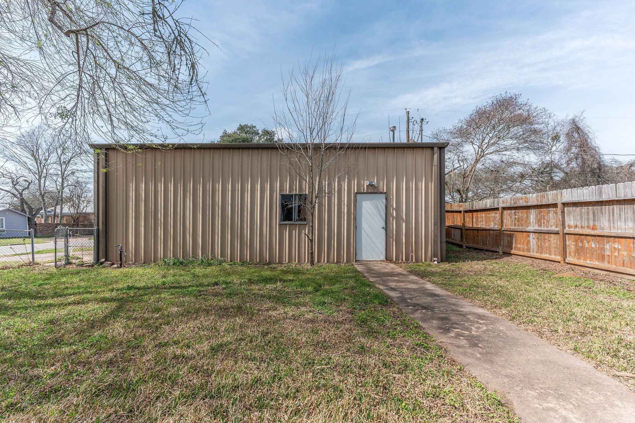 1310 Brazos Street Hempstead, TX 77445 - Photo 29 of 43 a view of a backyard of the house