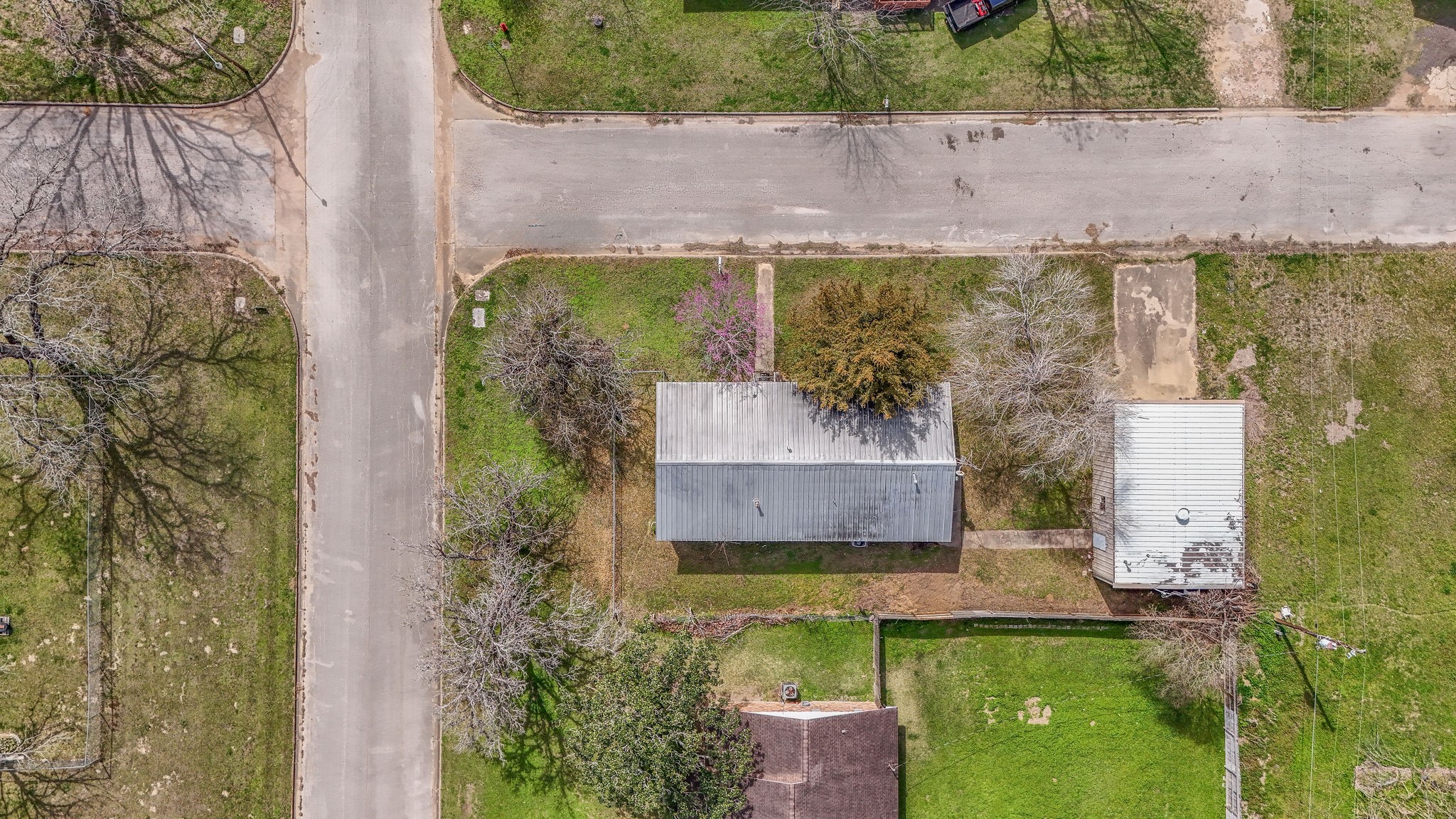 1310 Brazos Street Hempstead, TX 77445 - Photo 36 of 43 an aerial view of a house with a yard