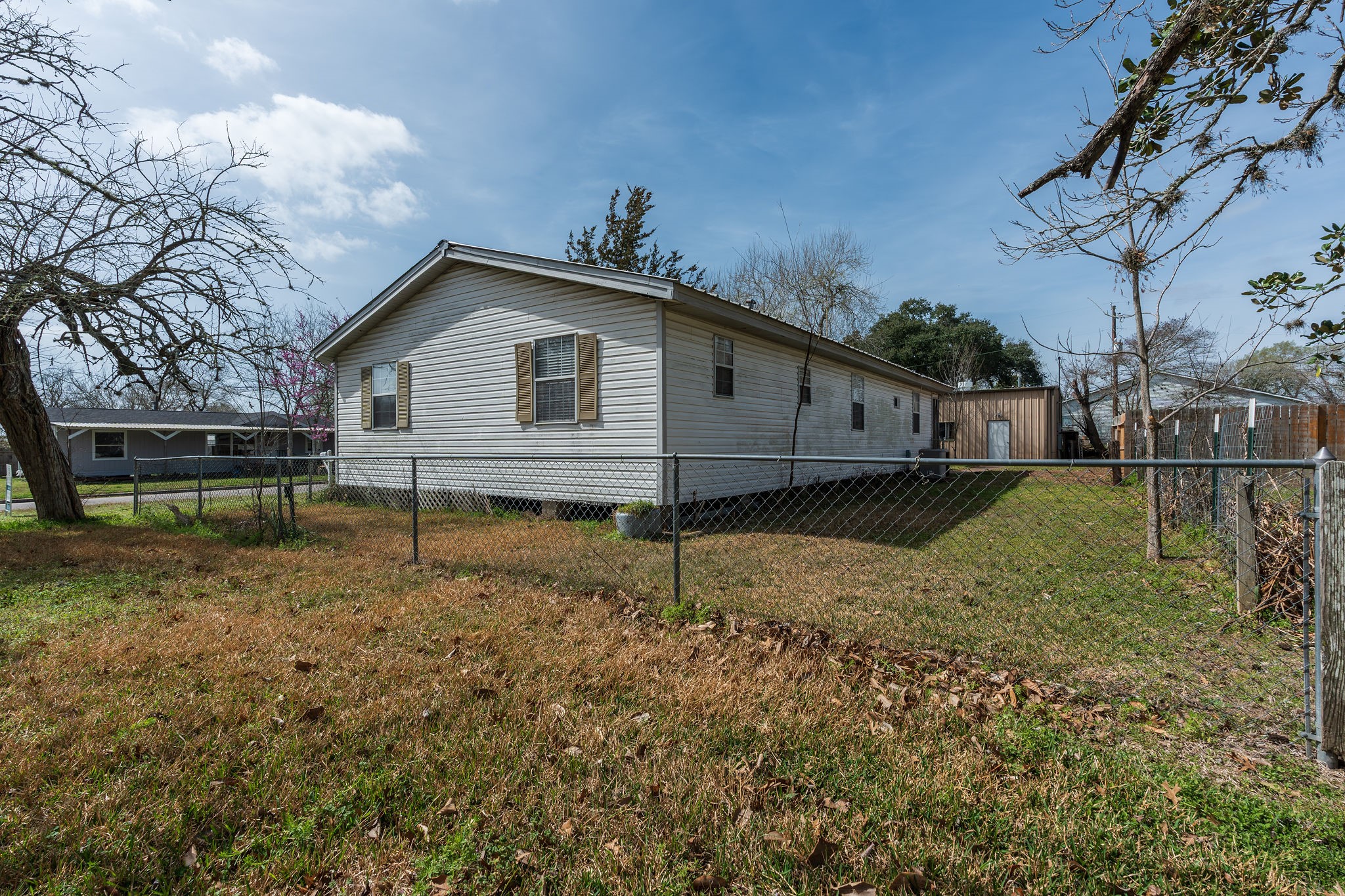 1310 Brazos Street Hempstead, TX 77445 - Photo 5 of 43 a house view with a backyard space