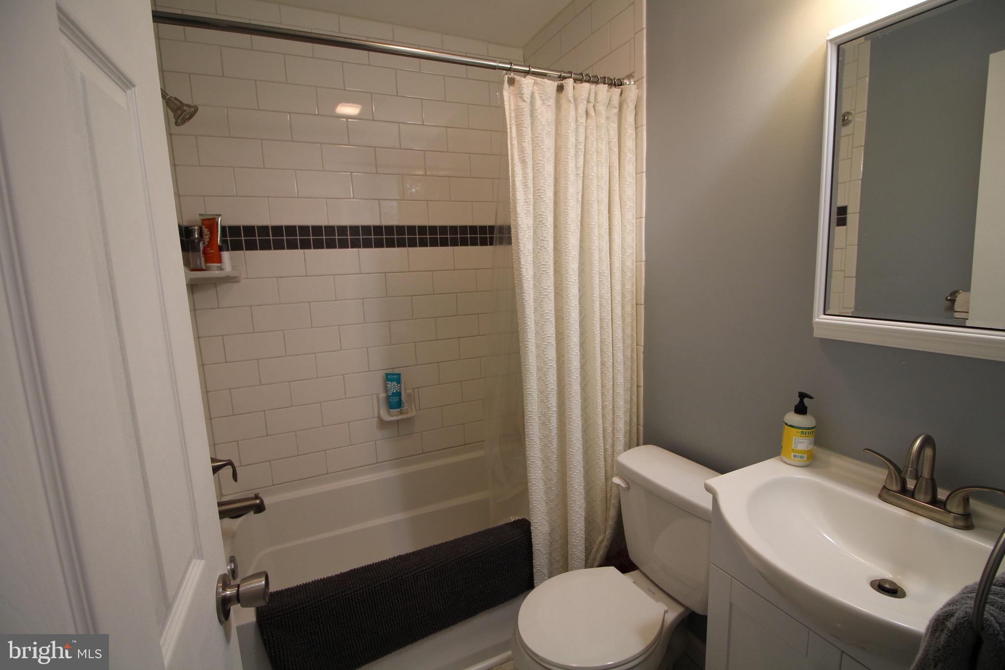 112 Harvard Road Glassboro, NJ 08028 - Photo 17 of 24 a bathroom with a sink toilet and shower