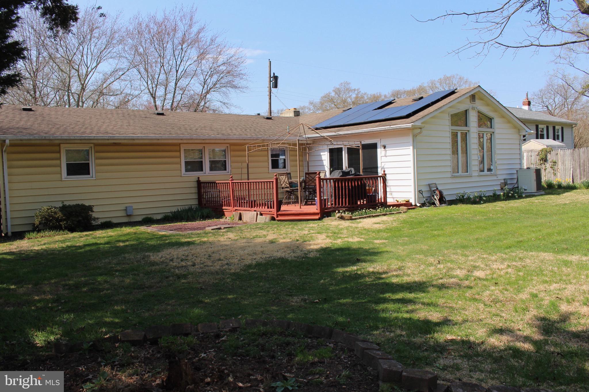 112 Harvard Road Glassboro, NJ 08028 - Photo 3 of 24 a view of a house with a yard and sitting area