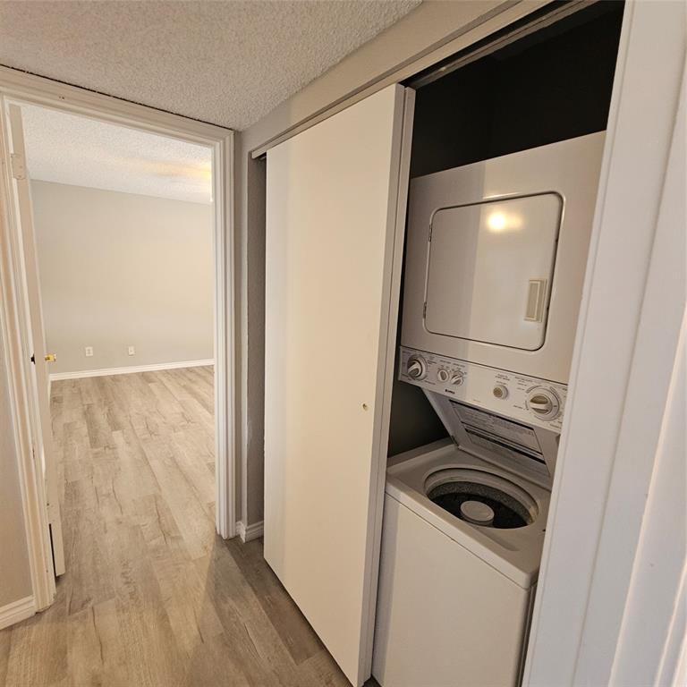 5750 Phoenix Drive, Unit 15 Dallas, TX 75231 - Photo 18 of 23 a bathroom with a sink and a mirror