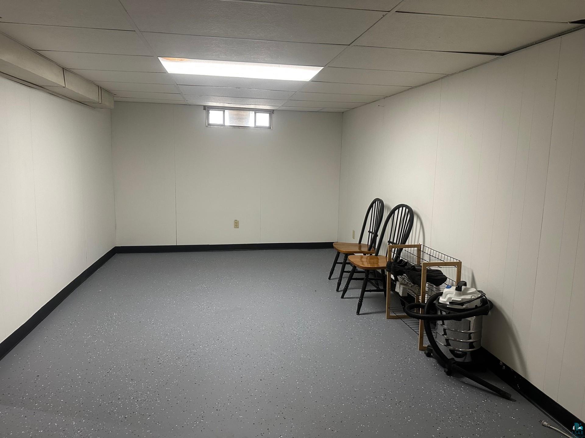 702 27th Street Cloquet, MN 55720 - Photo 13 of 25 Unfurnished room with a drop ceiling and baseboards