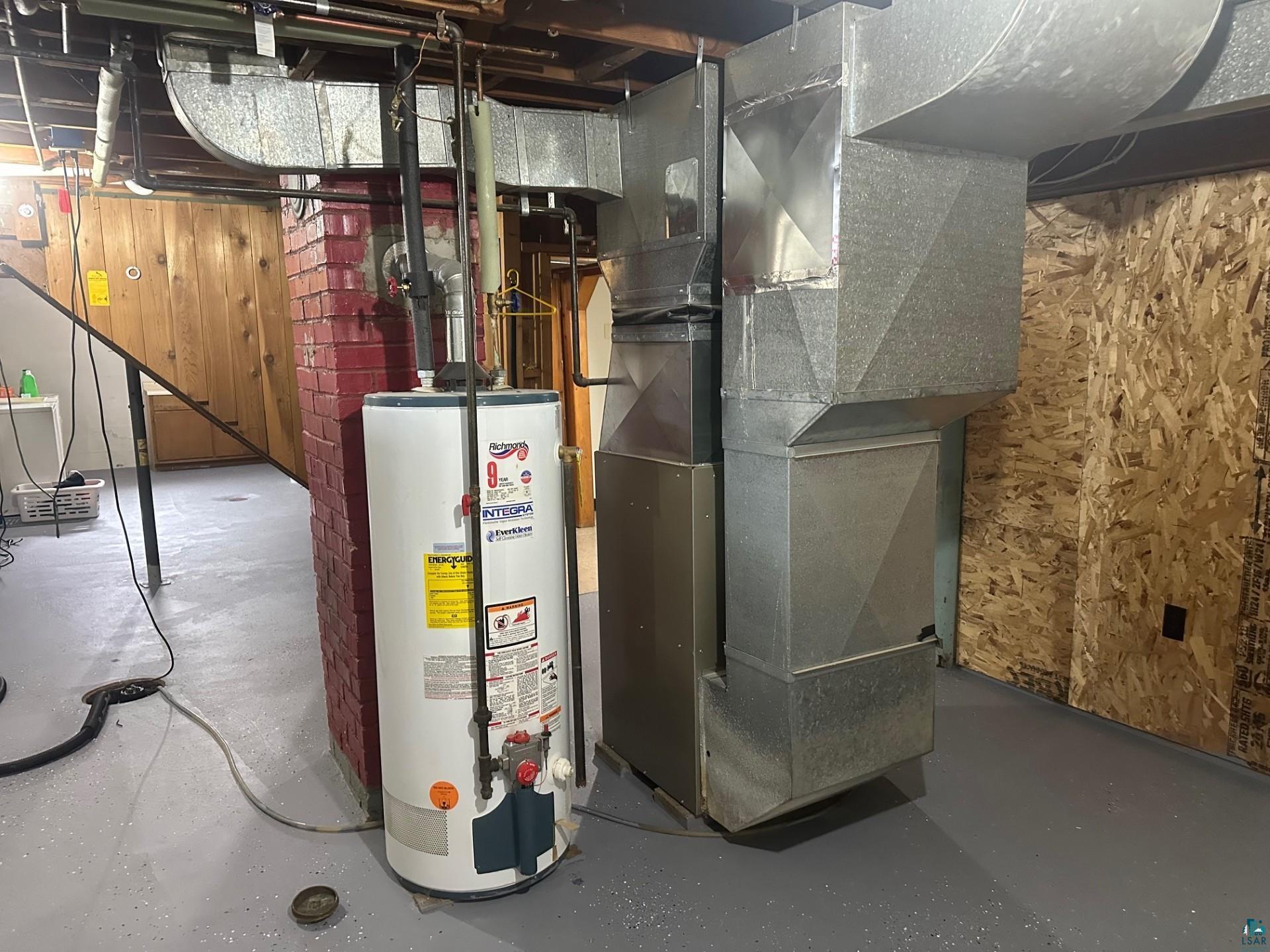 702 27th Street Cloquet, MN 55720 - Photo 18 of 25 Utilities featuring water heater and heating unit