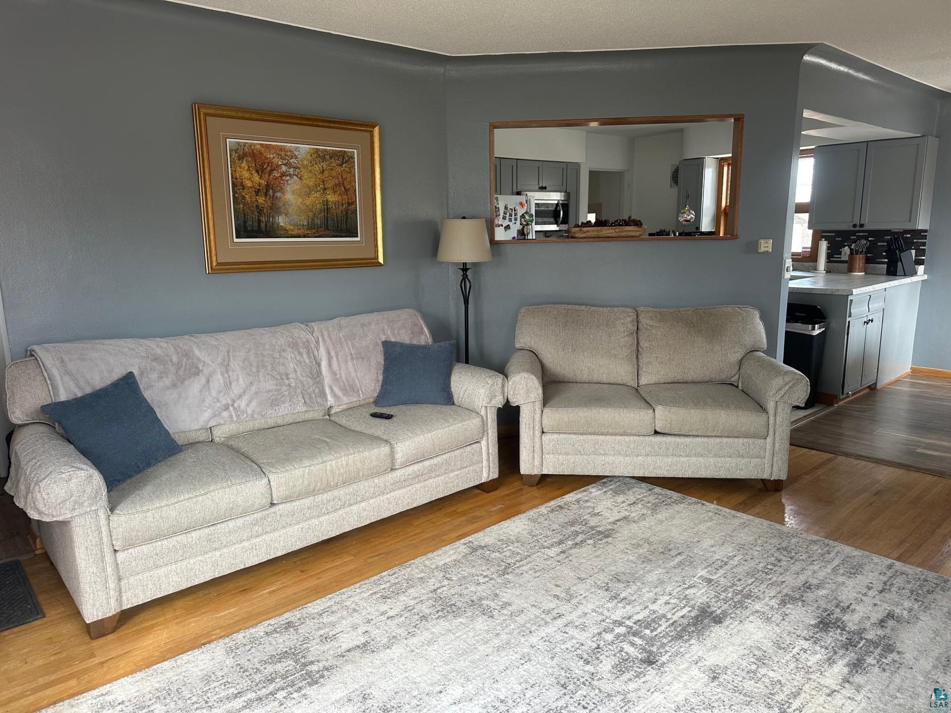702 27th Street Cloquet, MN 55720 - Photo 3 of 25 Living area with dark wood-style floors