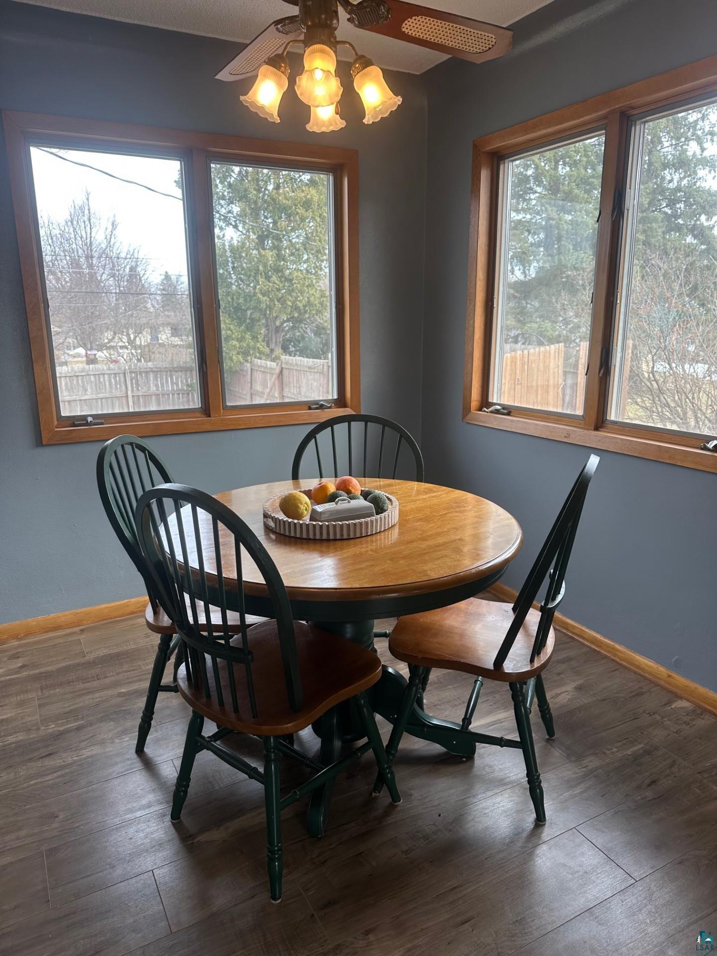 702 27th Street Cloquet, MN 55720 - Photo 6 of 25 Dining room featuring dark wood-style floors and ceiling fan