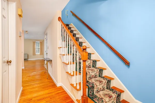 a view of balcony with wooden floor