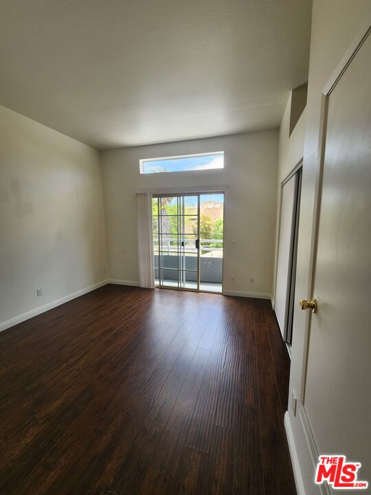 4328 Whitsett Avenue, Unit 4 Studio City, CA 91604 - Photo 19 of 73 an empty room with wooden floor and windows