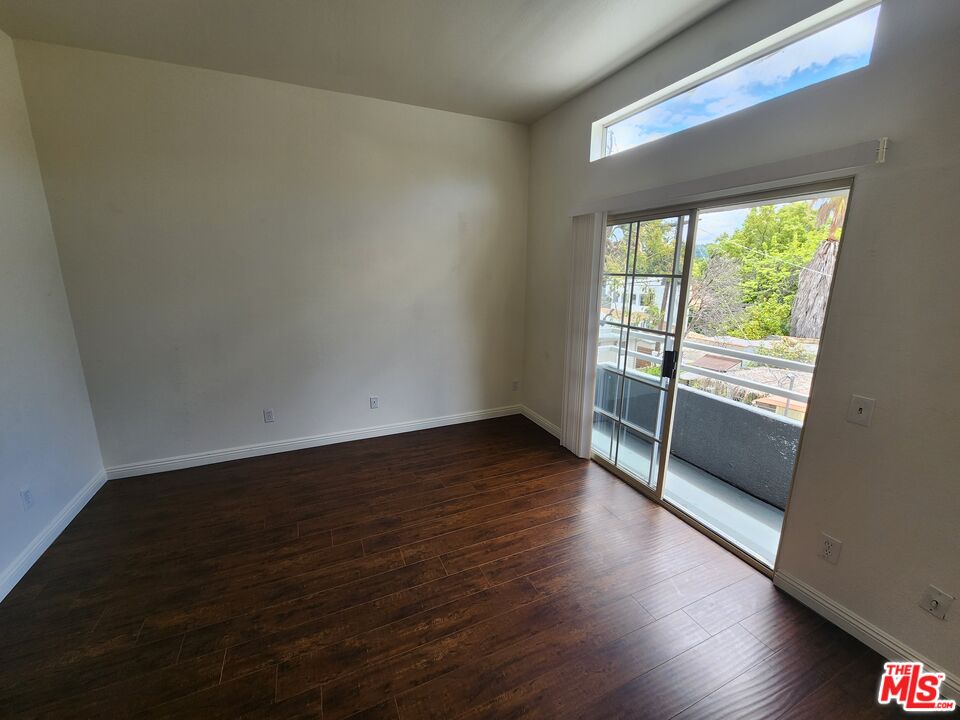 4328 Whitsett Avenue, Unit 4 Studio City, CA 91604 - Photo 24 of 73 a view of wooden floor and windows in a room