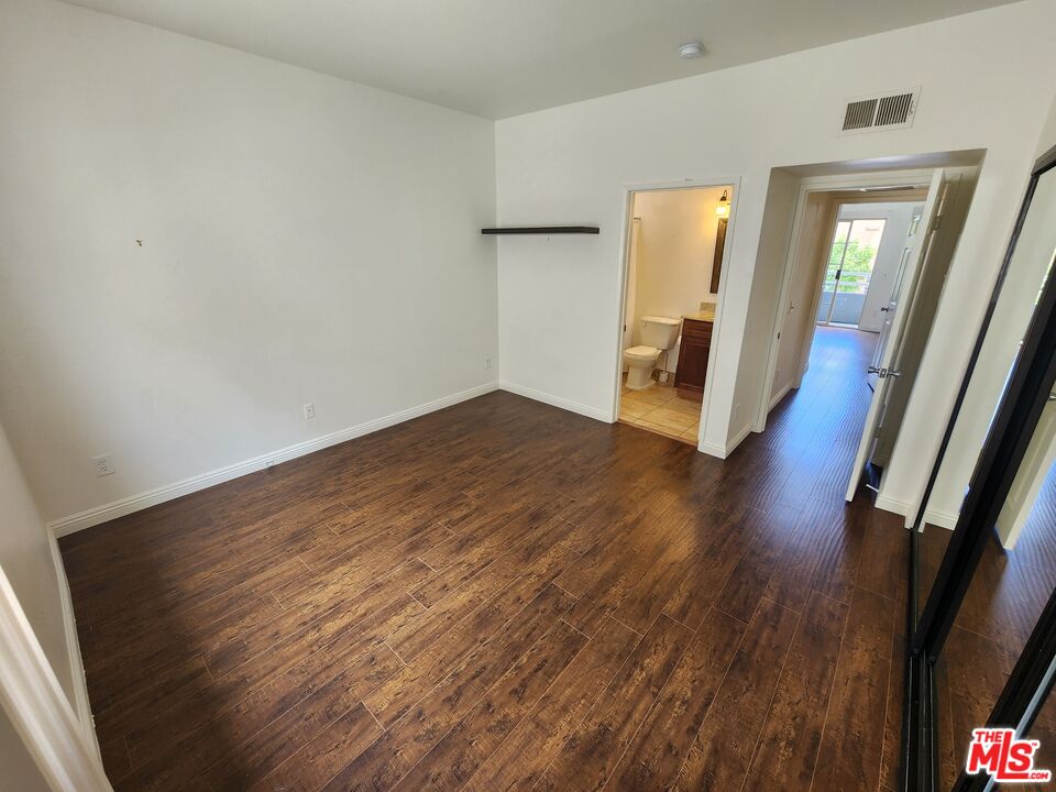 4328 Whitsett Avenue, Unit 4 Studio City, CA 91604 - Photo 5 of 73 a view of a room with wooden floor and staircase