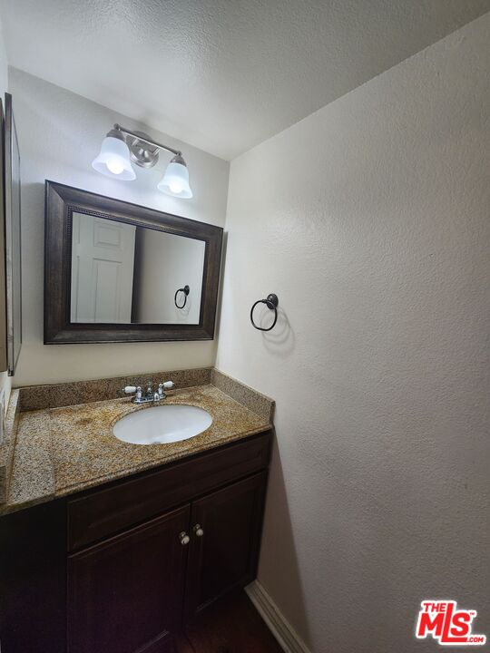 4328 Whitsett Avenue, Unit 4 Studio City, CA 91604 - Photo 55 of 73 a bathroom with a sink and a mirror