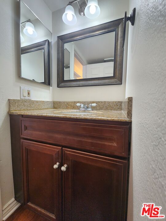 4328 Whitsett Avenue, Unit 4 Studio City, CA 91604 - Photo 57 of 73 a bathroom with a sink and a mirror