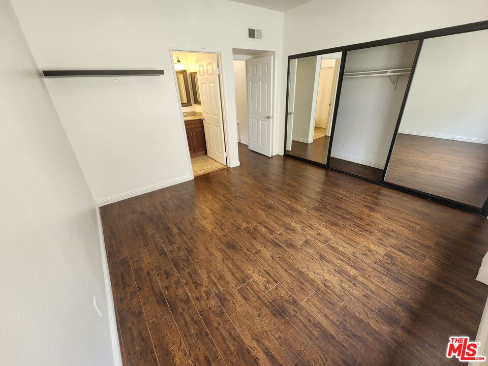 4328 Whitsett Avenue, Unit 4 Studio City, CA 91604 - Photo 8 of 73 a view of a room with wooden floor and staircase