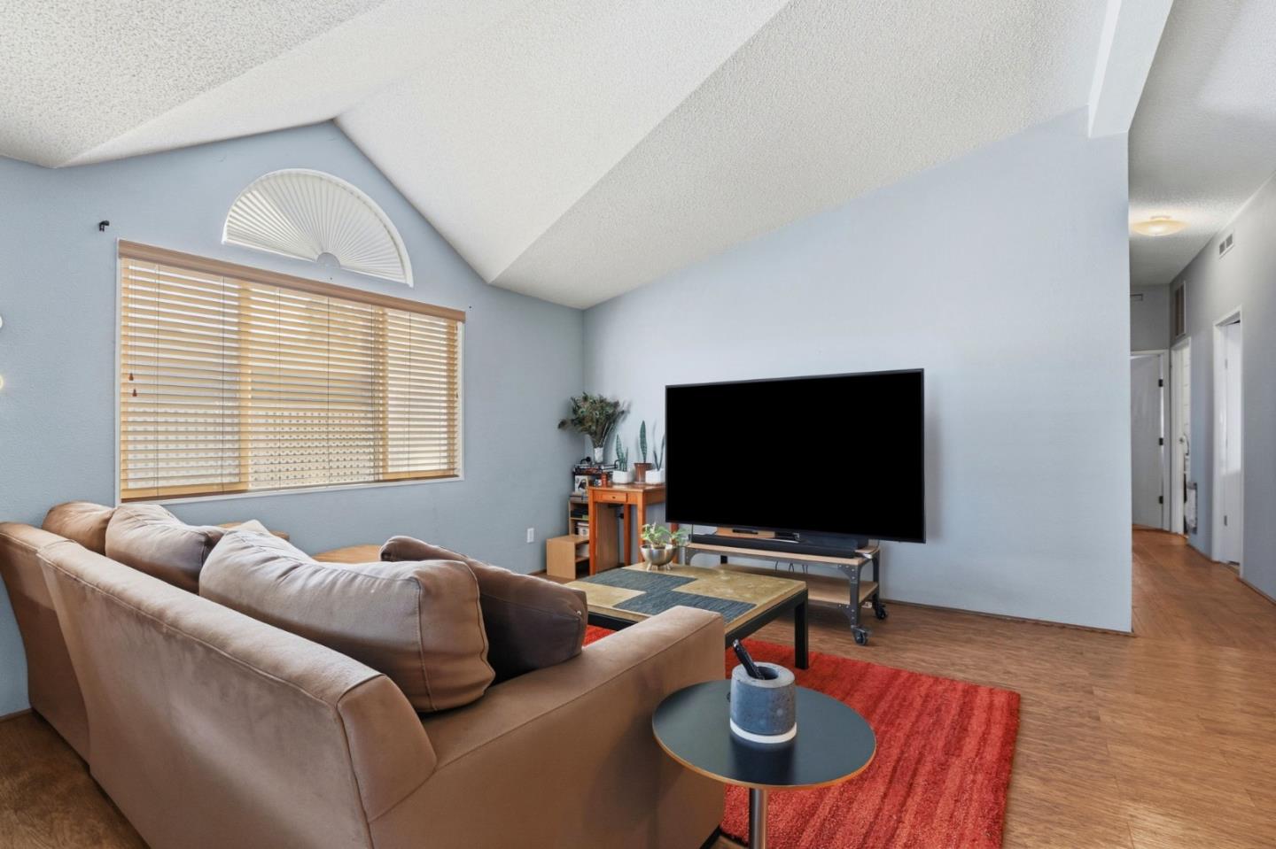 20 Russell Road, Unit 8 Salinas, CA 93906 - Photo 5 of 38 a living room with furniture and a flat screen tv
