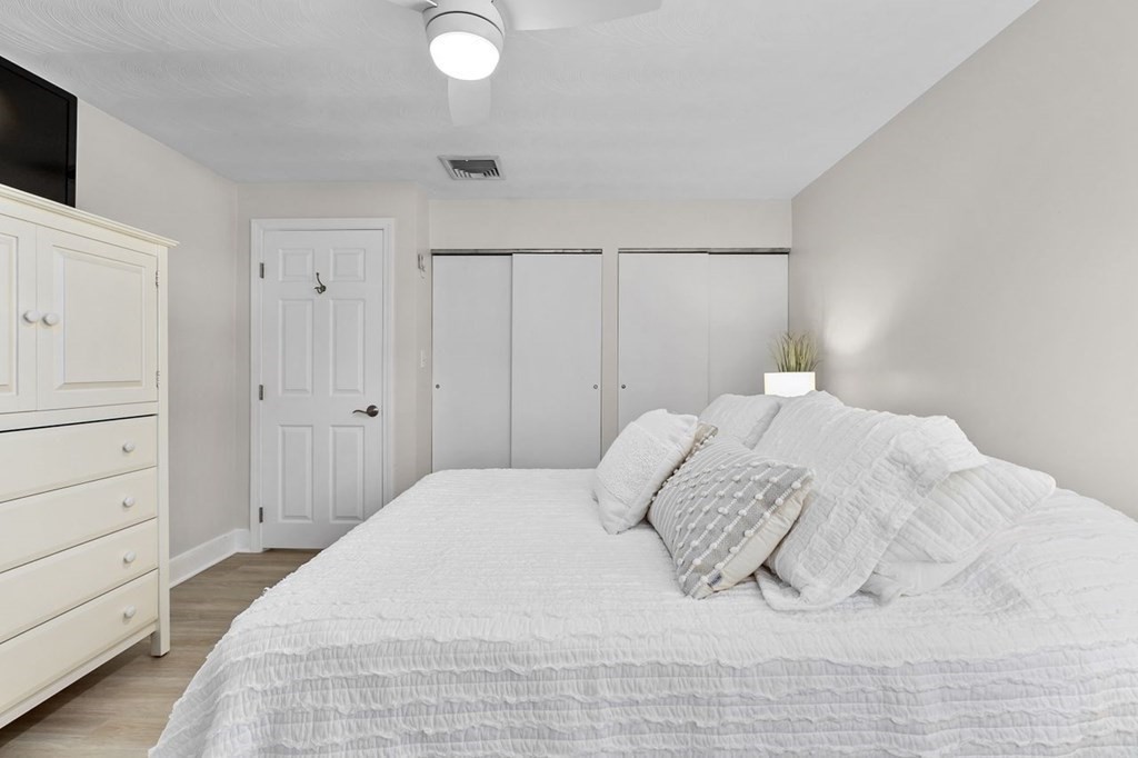 26 Doris Road Framingham, MA 01701 - Photo 14 of 36 a bedroom with a bed and a tv