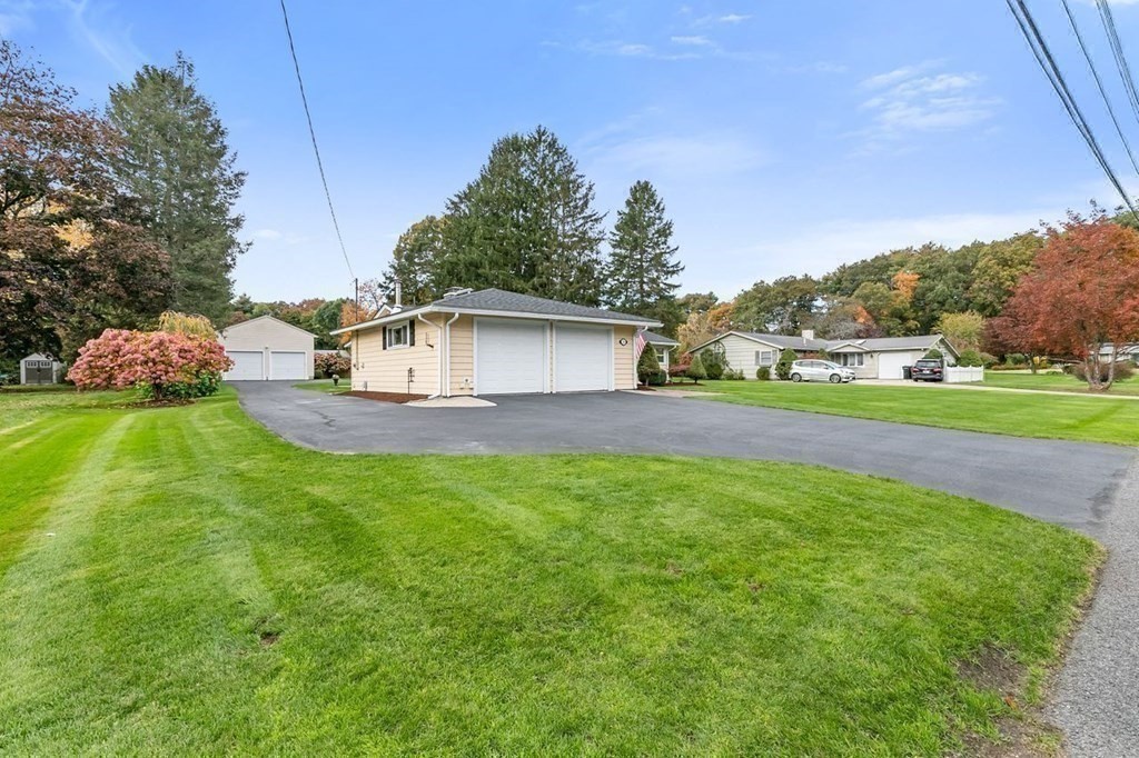 26 Doris Road Framingham, MA 01701 - Photo 26 of 36 a view of a house with a backyard