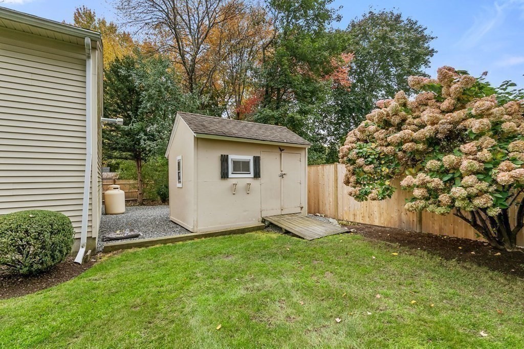 26 Doris Road Framingham, MA 01701 - Photo 30 of 36 a view of a house with a yard and large tree