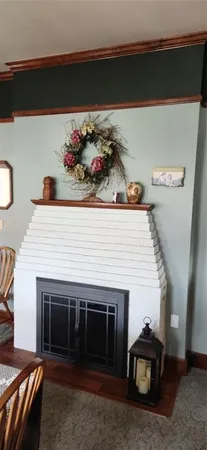 a view of a livingroom with furniture and windows