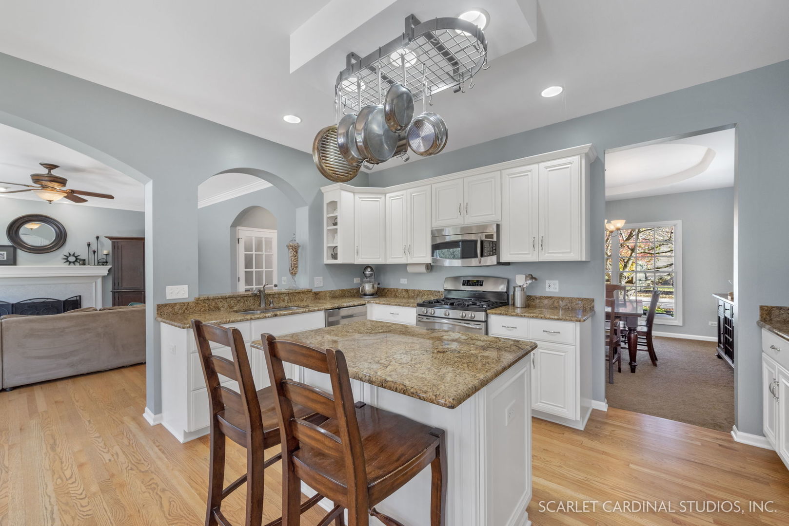 4860 Snapjack Circle Naperville, IL 60564 - Photo 2 of 35 a view of a dining room with furniture and wooden floor