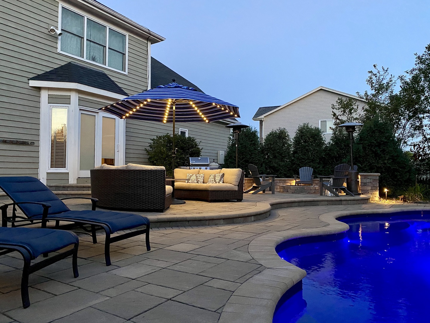 4860 Snapjack Circle Naperville, IL 60564 - Photo 30 of 35 a outdoor space with patio couch and a fire pit